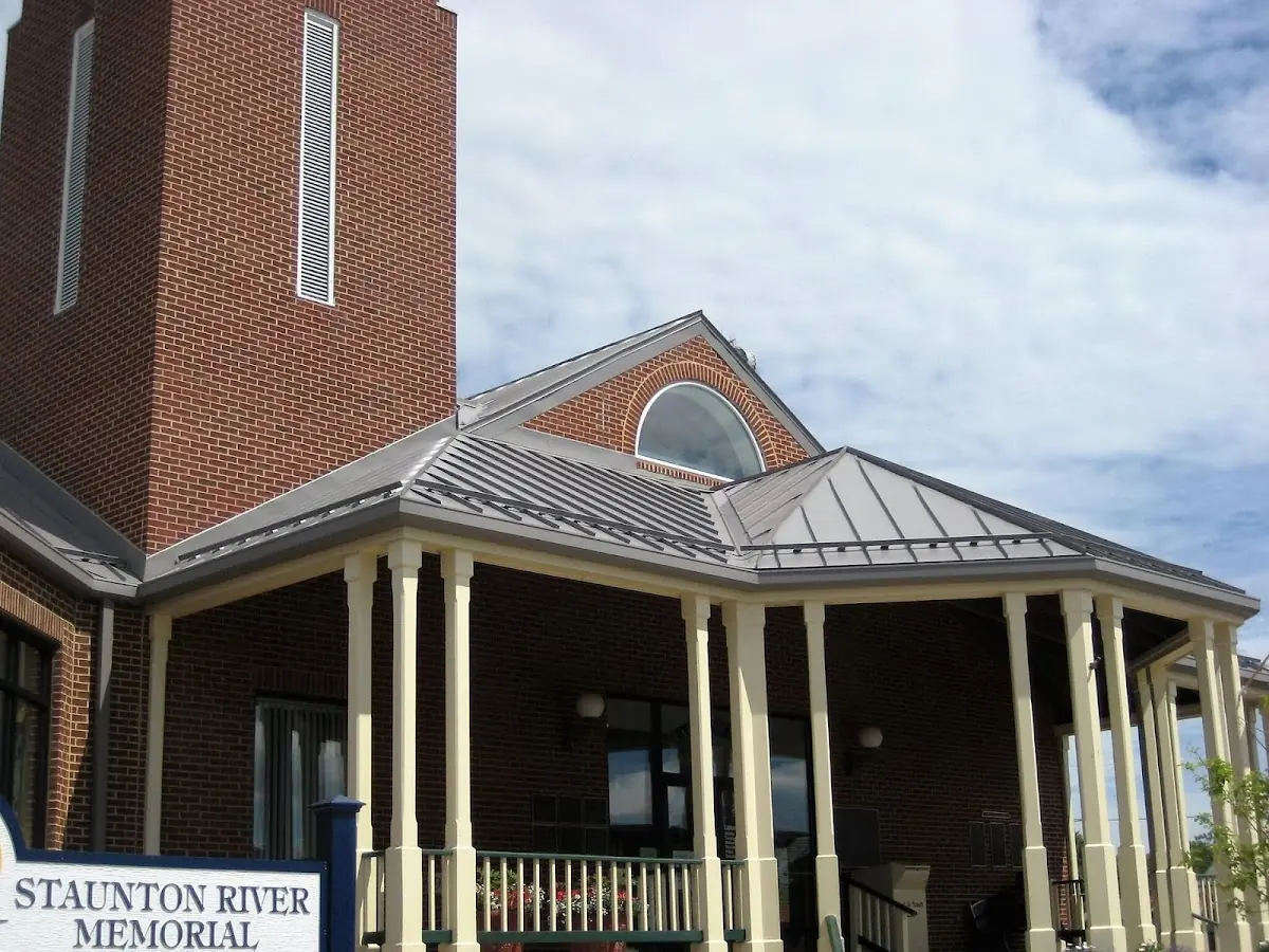Skilled roofing craftsmen working on a residential roof in Ottawa